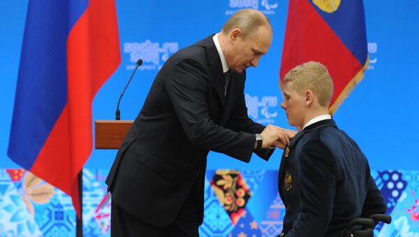 В.Путин вручил государственные награды чемпионам и призерам XI зимних Паралимпийских игр. Фото с места события