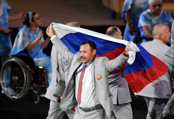 Андрей Фомочкин с флагом России