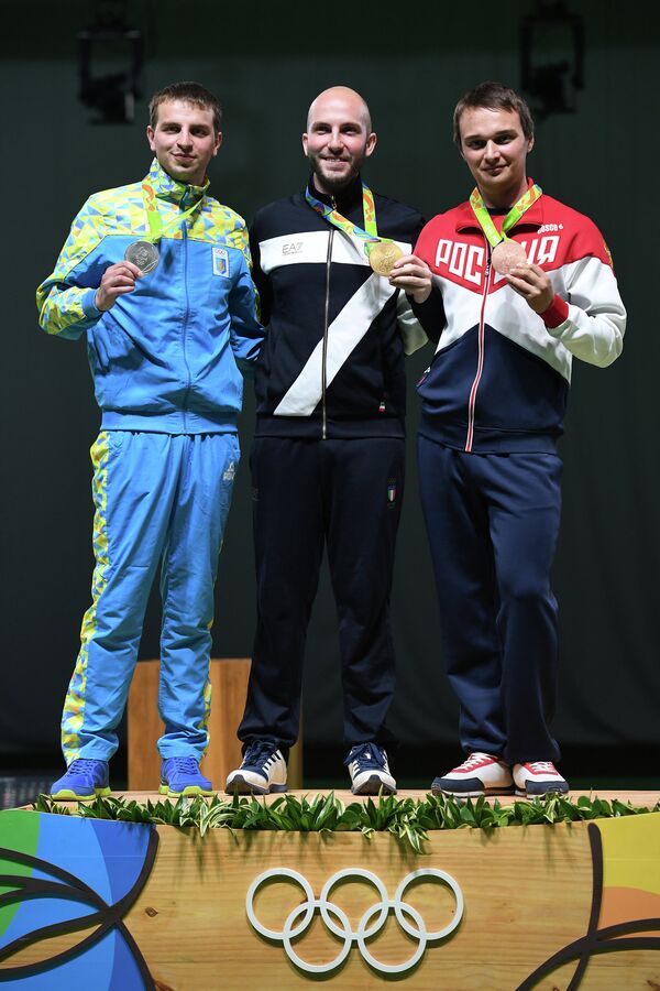 Сергей Кулиш - серебряная медаль, Никколо Камприани - золотая медаль, Владимир Масленников - бронзовая медаль (слева направо)