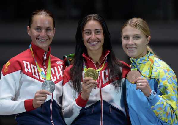 Софья Великая - серебряная медаль, Яна Егорян - золотая медаль, Ольга Харлан - бронзовая медаль (слева направо)