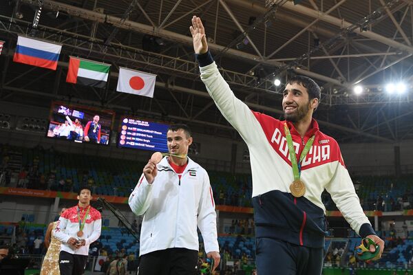 Хасан Халмурзаев - золотая медаль, Серджио Тому и Таканори Нагасэ - бронзовые медали (слева направо)