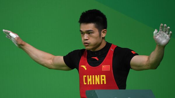 Китайский тяжелоатлет Ши Чжиюн