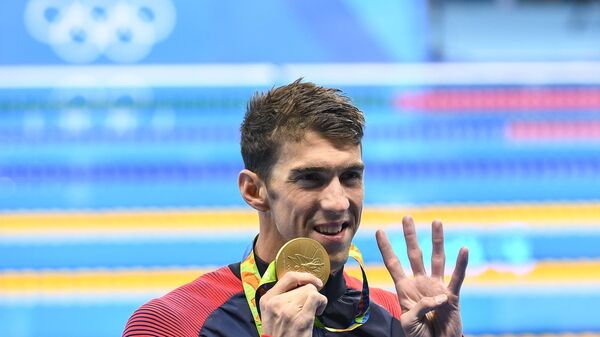 Американский пловец Майкл Фелпс, выигравший 23-ю золотую медаль на ОИ в  карьере - РИА Новости Спорт, 14.08.2016