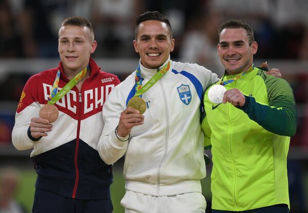 Денис Аблязин - бронзовая медаль, Элефтериос Петруниас - золотая медаль, Артур Дзанетти - серебряная медаль (слева направо)