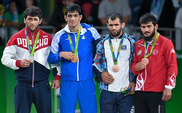 Аниуар Гедуев, Хасан Яздани, Джабраил Гасанов и Сонер Демирташ (слева направо)