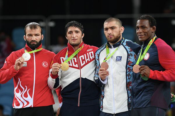 Селим Ясар (Турция), Абдулрашид Садулаев (Россия), Шариф Шарифов (Азербайджан) и Джейден Кокс (США) (слева направо)