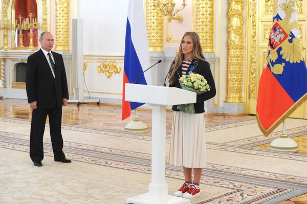 Президент РФ Владимир Путин и олимпийская чемпионка по синхронному плаванию Алла Шишкина