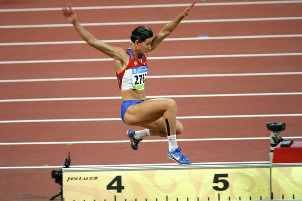 Россиянка Татьяна Лебедева во время соревнований на Олимпиаде в Пекине