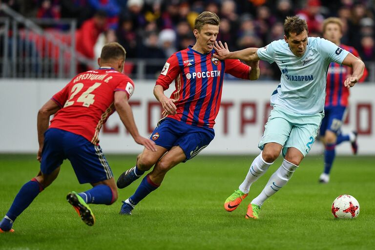 Защитник ПФК ЦСКА Василий Березуцкий, полузащитник Понтус Вернблум и нападающий ФК Зенит Артём Дзюба (слева направо) Защитник ПФК ЦСКА Василий Березуцкий, полузащитник Понтус Вернблум и нападающий ФК Зенит Артём Дзюба (слева направо)