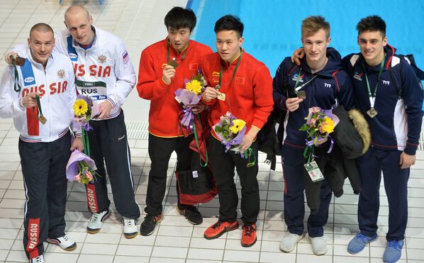 Евгений Кузнецов и Илья Захаров (Россия), Цао Юань и Се Сыи (Китай), Джек Ло и Крис Мирс (Великобритания) (слева направо)