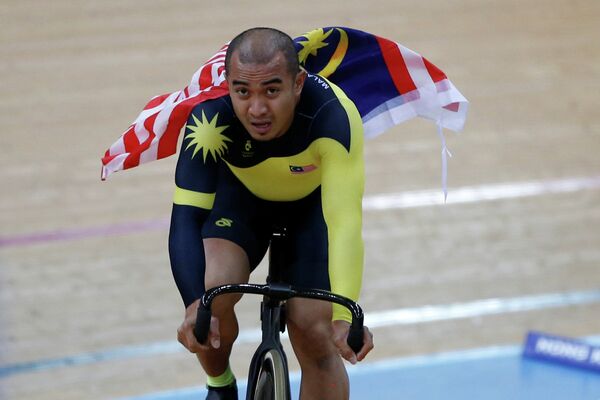 Малайзийский велогонщик Азизульхасни Аванг
