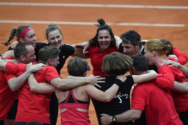 Сборная Бельгии по теннису радуется победе