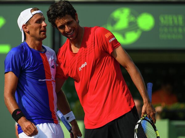 Польский теннисист Лукаш Кубот и бразилец Марсело Мело (слева направо)