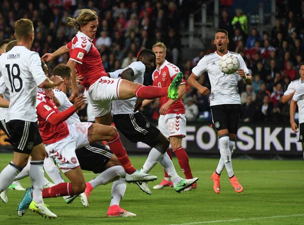 Игровой момент матча Дания - Германия