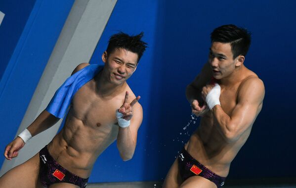 Чэнь Айсэнь и Ян Хао (слева направо)