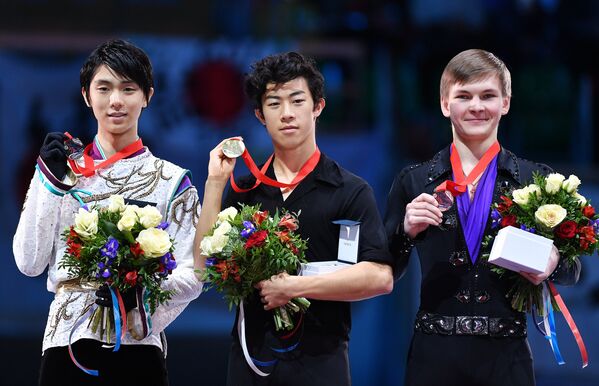 Юдзуру Ханю, Натан Чен и Михаил Коляда (слева направо)