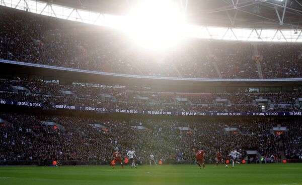 Игровой момент матча чемпионата Англии по футболу между Тоттенхэмом и Ливерпулем
