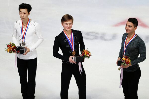 Китаец Цзинь Боян, россиянин Михаил Коляда и американец Макс Аарон (слева направо)