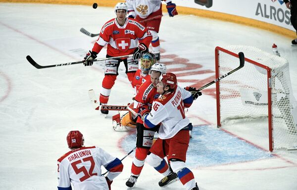 Игровой момент матча Швейцария - Россия