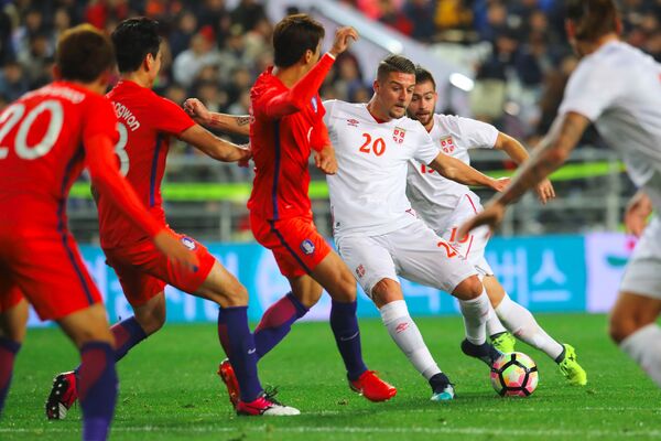 Игровой момент матча Южная Корея - Сербия
