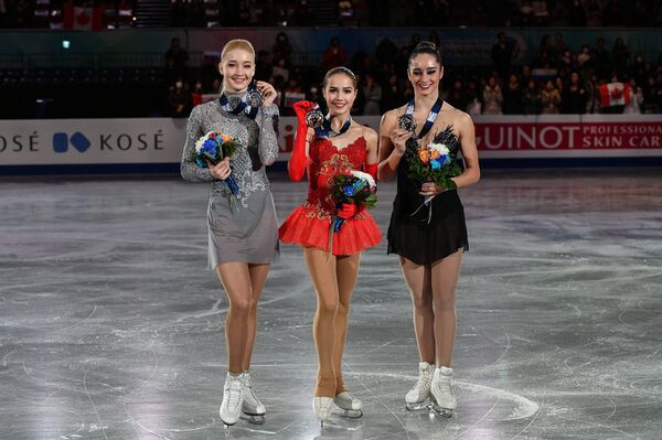 Мария Сотскова, Алина Загитова и Кейтлин Осмонд (слева направо)