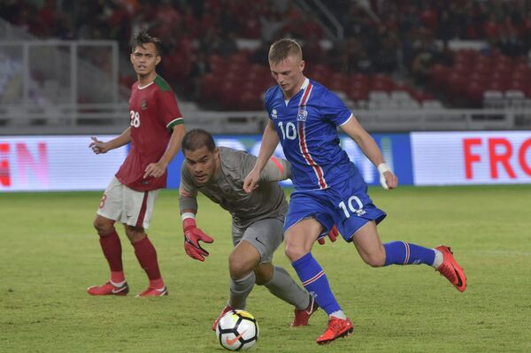 Игровой момент матча Исландия - Индонезия