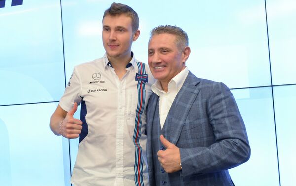 Пилот программы развития российского автоспорта SMP Racing гонщик Сергей Сироткин (слева) и основатель и руководитель SMP Racing Борис Ротенберг