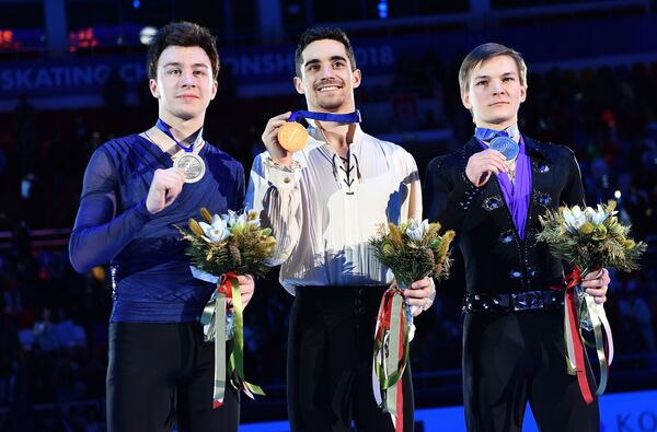 Дмитрий Алиев, Хавьер Фернандес, Михаил Коляда (слева направо)