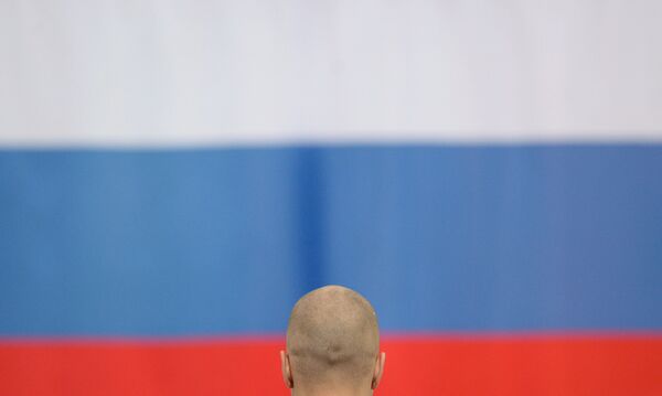 Павел Кулижников и российский флаг