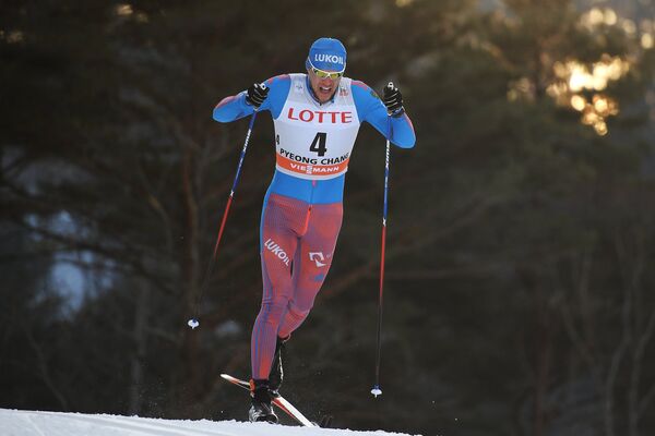 Александр Панжинский на дистанции спринта на этапе Кубка мира по лыжным гонкам в Пхенчхане