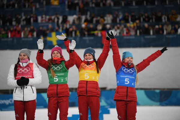 Российские лыжницы Наталья Непряева, Юлия Белорукова, Анастасия Седова и Анна Нечаевская (слева направо)