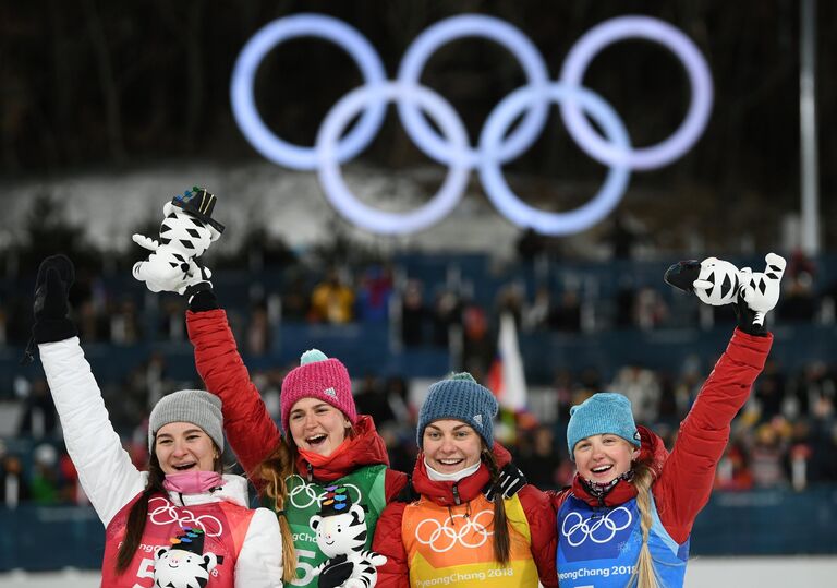 Российские лыжницы Наталья Непряева, Юлия Белорукова, Анастасия Седова и Анна Нечаевская (слева направо)