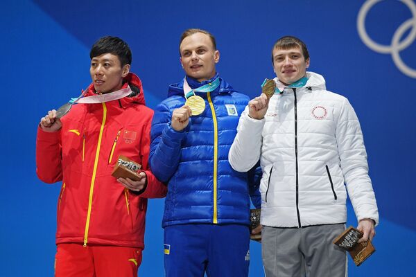 Цзя Цзунъян, Александр Абраменко, Илья Буров (слева направо)
