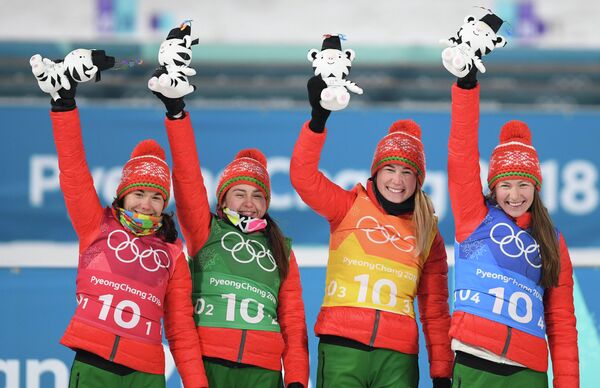 Белорусские биатлонистки Надежда Скардино, Ирина Кривко, Симон Детьё и Динара Алимбекова (слева направо)