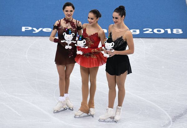 Евгения Медведева, Алина Загитова, Кейтлин Осмонд (слева направо)
