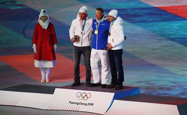 Александр Большунов, Йиво Нисканен и Андрей Ларьков (слева направо)