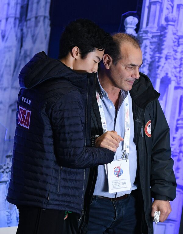 Натан Чен (США) и его тренер Рафаэль Арутюнян