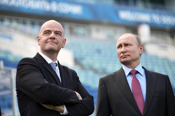 Владимир Путин и Джанни Инфантино (слева)