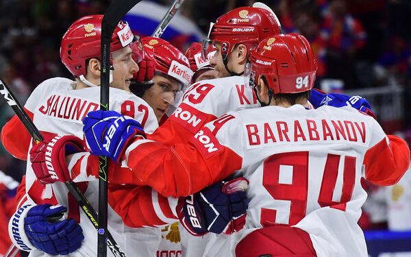 Хоккеисты сборной России Александр Барабанов, Илья Каблуков, России Никита Зайцев и Максим Шалунов (справа налево)