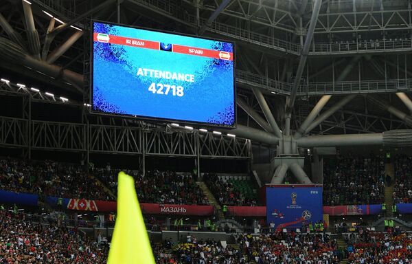 Экран с информацией о количестве болельщиком матча Иран - Испания
