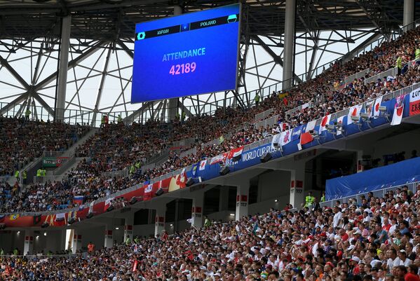 Электронное табло с информацией во время матча Япония - Польша