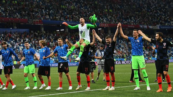 Футболисты сборной Хорватии радуются победе