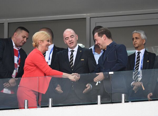 Председатель правительства РФ Дмитрий Медведев и президент Республики Хорватия Колинда Грабар-Китарович на трибуне
