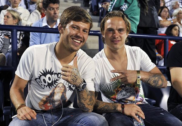 Футболисты Федор Смолов (слева) и Андрей Ещенко (справа)