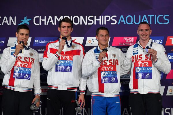 Российские пловцы, завоевавшие золото в эстафете 4 по 100 вольным стилем на чемпионате Европы в Глазго