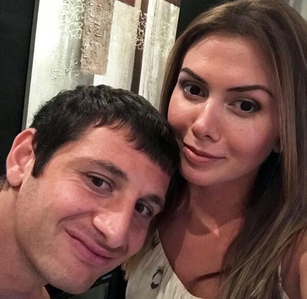 Футболист Алан Дзагоев (слева) и его супруга Зарема (справа)