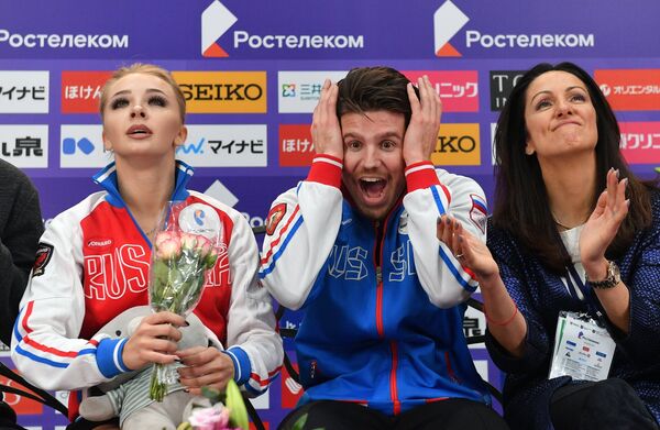 Александра Степанова, Иван Букин и тренер Ирина Жук (слева направо)