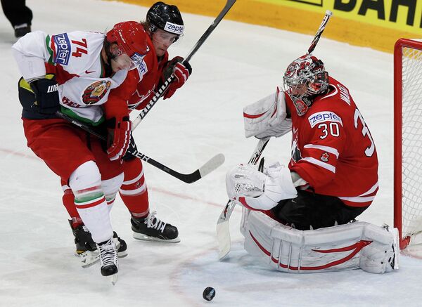 Игровой момент матча Канада - Белоруссия