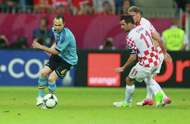 Andres Iniesta (left), Dario Srna (center) and Domaga Vida