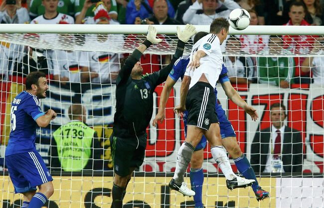 Miroslav Klose scores a goal